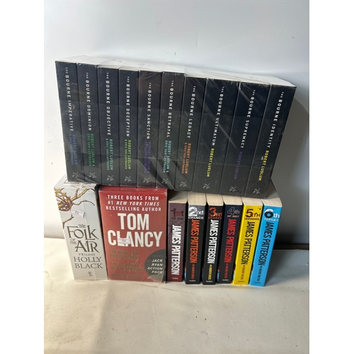 220 - Collection of books - mostly new - inc Jason Bourne, Folk of the Air trilogy, Tom Clancy and James P... 
