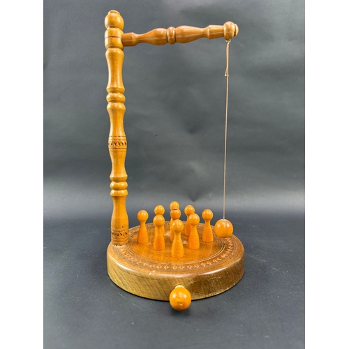318 - Table top wooden swing skittles game