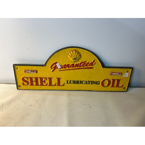 211 - Shell oil cast iron sign