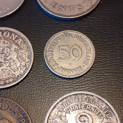 311A - Silver and other collectible coins to include 1906 Krone (eb), 1923 2 Franc coin, 1945 2 Francs and ... 