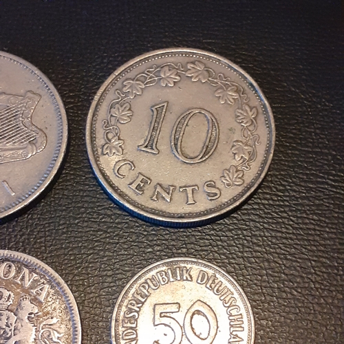 311A - Silver and other collectible coins to include 1906 Krone (eb), 1923 2 Franc coin, 1945 2 Francs and ... 