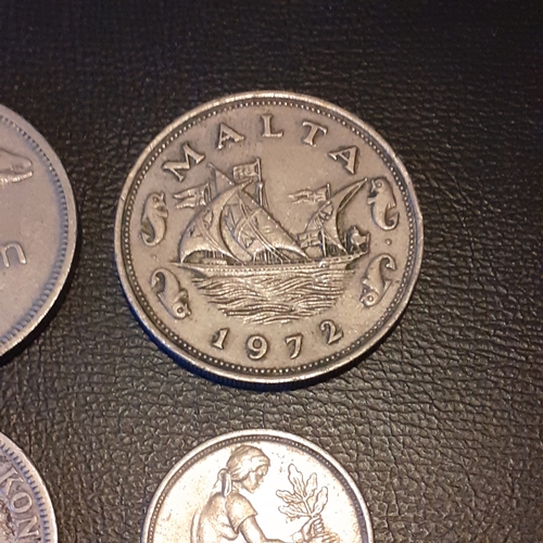 311A - Silver and other collectible coins to include 1906 Krone (eb), 1923 2 Franc coin, 1945 2 Francs and ... 