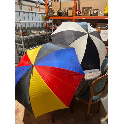 82 - Very large black & white and multi coloured umbrellas
