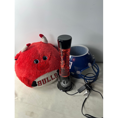 107 - Star Wars lava lamp, large bulls plush and NFL feeding helmet