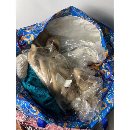200 - Large bag of mixed clothing inc new items and knit wear