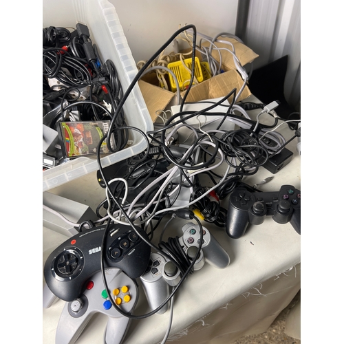 202 - Gaming lot inc PS3, PS2, mega drive & N64 controllers, various console leads and accessories