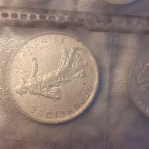 312A - Various Belgique and French Francs and Cents. Includes half Franc 20 Franc, 50 Franc coins and more.... 