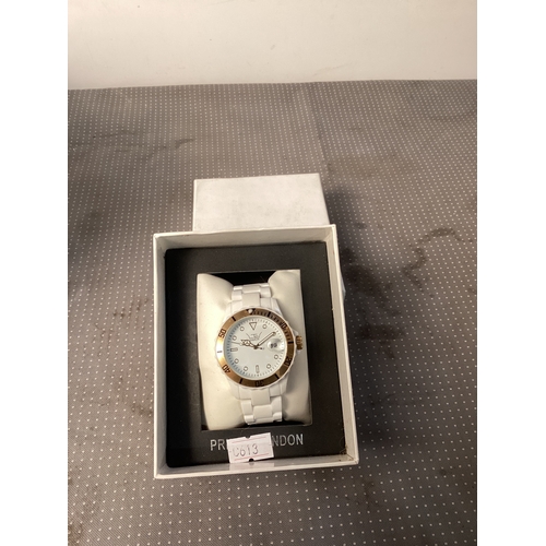 240 - LTC watch, with Date square, white with gold face surround