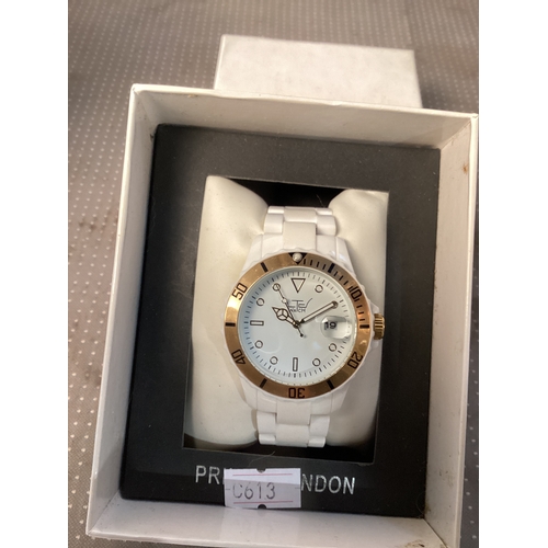 240 - LTC watch, with Date square, white with gold face surround
