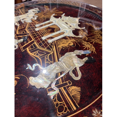 254 - A fantastic example of a Chinese hardwood circular glazed table and 4 stools - mother of pearl inlay... 