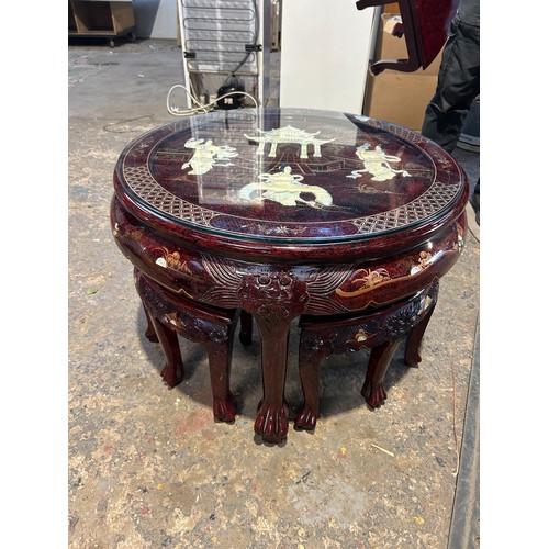 254 - A fantastic example of a Chinese hardwood circular glazed table and 4 stools - mother of pearl inlay... 