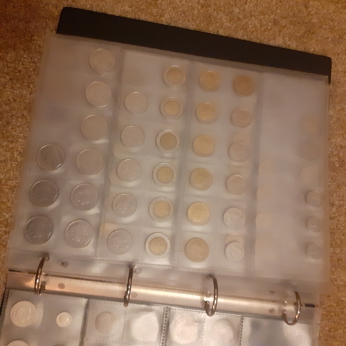 315A - Folder containing pages of coins mostly European countries pre Euro. Lira, Francs, Swiss coinage etc... 