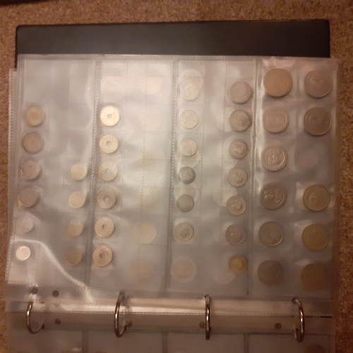 315A - Folder containing pages of coins mostly European countries pre Euro. Lira, Francs, Swiss coinage etc... 