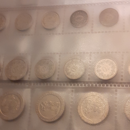 315A - Folder containing pages of coins mostly European countries pre Euro. Lira, Francs, Swiss coinage etc... 