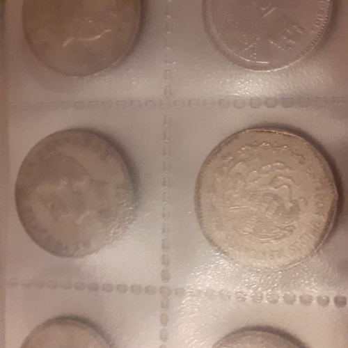 315A - Folder containing pages of coins mostly European countries pre Euro. Lira, Francs, Swiss coinage etc... 