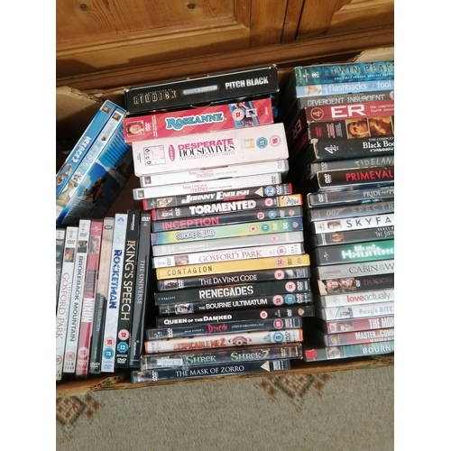 Large box of DVDs including box sets