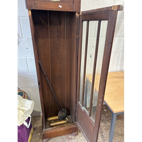 Tall oak cased grandfather clock with pendulum and weights - over 6ft tall