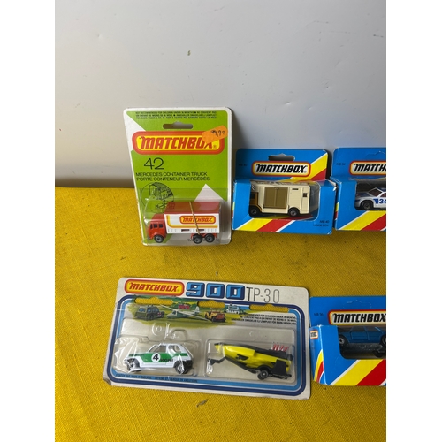 76 - Quantity of matchbox super fast carded vehicles - some in blue boxes