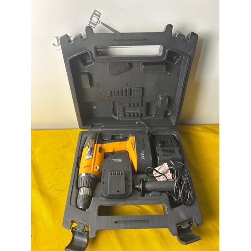 90 - Cordless JCB drill with 2x batteries and charger - working
