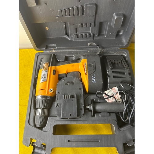 90 - Cordless JCB drill with 2x batteries and charger - working