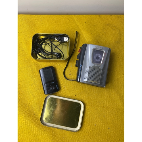 93 - Sony TCM-20DV personal cassette pplayer and Philips goGear MP3 player