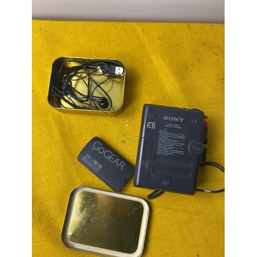 93 - Sony TCM-20DV personal cassette pplayer and Philips goGear MP3 player