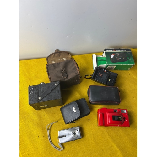 99 - Vintage cameras inc Canon Ixus I, hanimex camera and more
