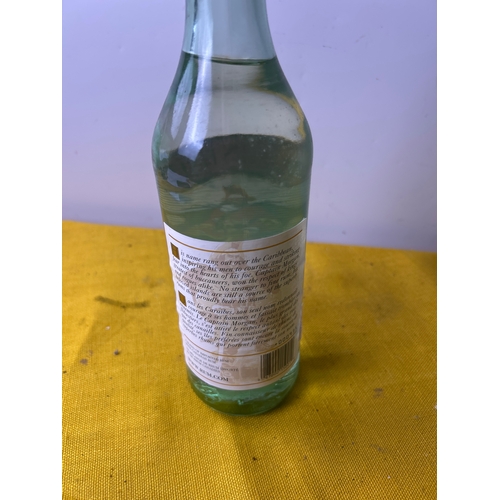 107 - Captain Morgan’s white rum - 750ml - lid cracked but contents full