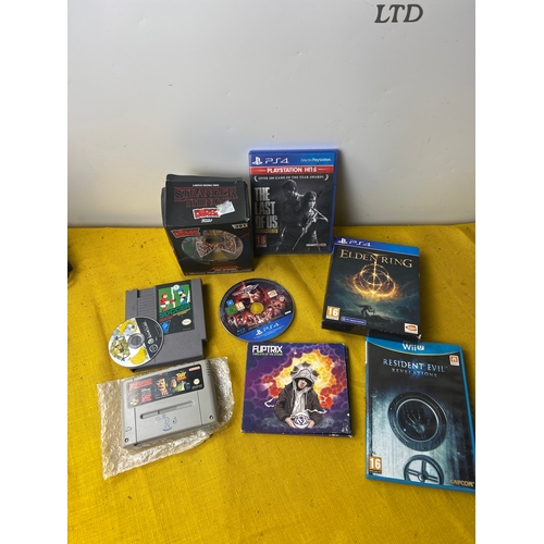 115 - Gaming console games inc Elden ring, the last of us, resident evil on Wii U, Toy Story on SNES and m... 