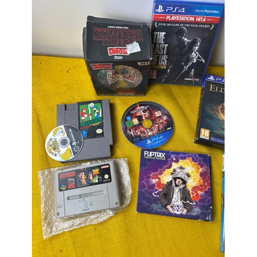 115 - Gaming console games inc Elden ring, the last of us, resident evil on Wii U, Toy Story on SNES and m... 
