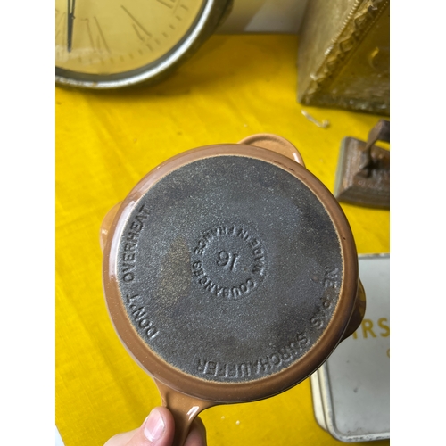 62 - Metal lot inc brass magazine rack, cast irons, acctim clock and cast iron french skillet