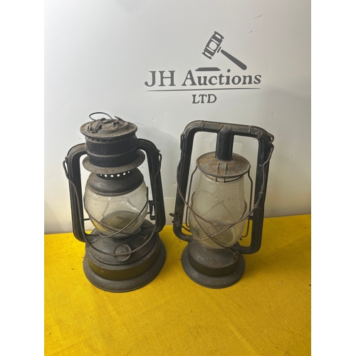 65 - Monarch and one other portable oil lanterns