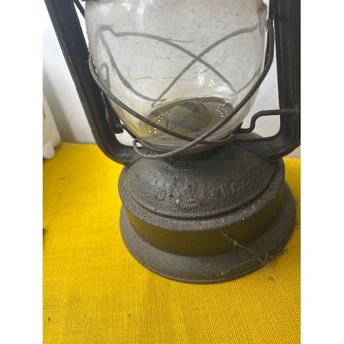 65 - Monarch and one other portable oil lanterns