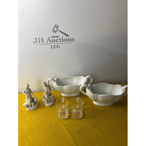 67 - Pair of Arthur wood fluted vases, German figurines and pair of Peroni glass tankards