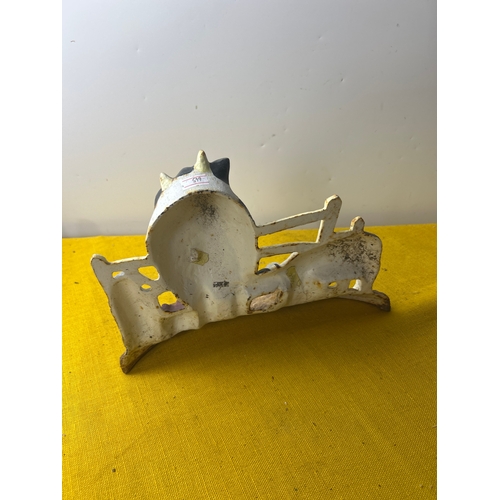 69 - Cast iron cow themed door stop