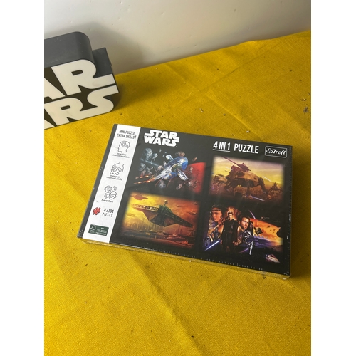 71 - Star Wars light up sign and sealed 4in1 puzzle