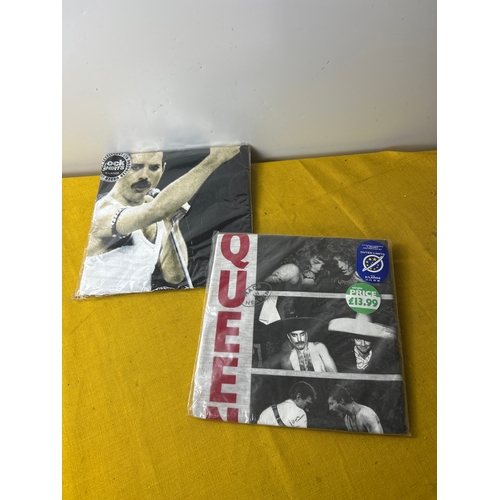 111 - Pair of Queen rock shirts - size XL from
The official concerts - sealed