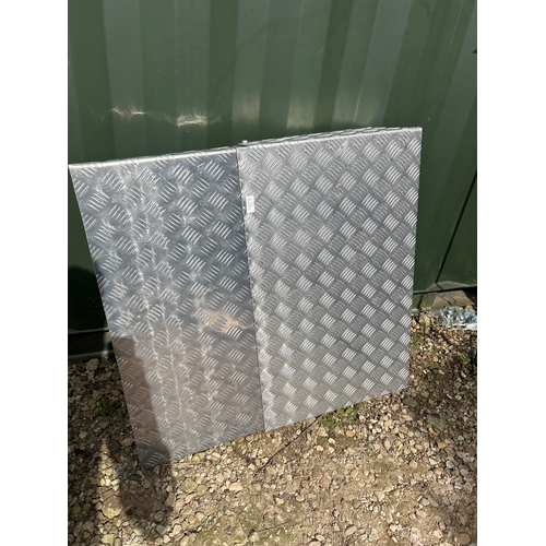 Folding chequer plate ramp in good condition.
