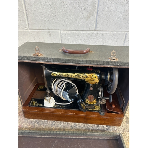 Singer vintage hand crank & electric sewing machine with case