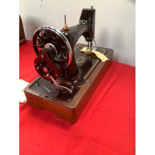 Vintage Singer Model 99K sewing machine in carry case