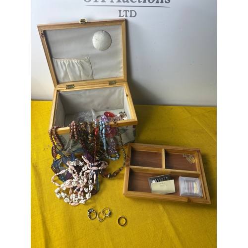 1 - Quantity of costume jewellery in sewing padded box inc costume rings - one is Cartier style