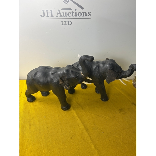 2 - Pair of leather clad decorative elephants with plastic tusks - 35cm long