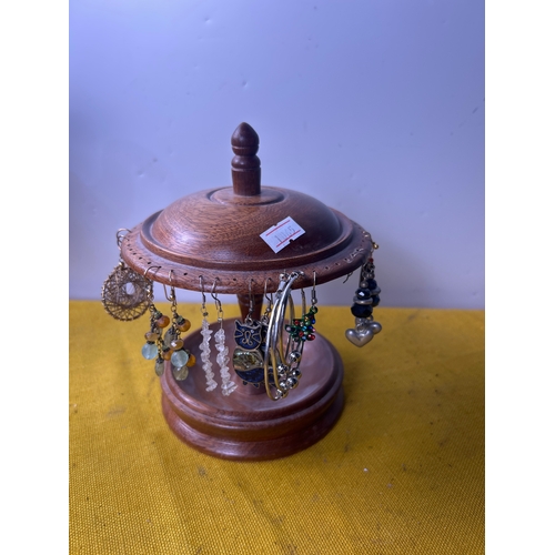 4 - Costume earrings on a carousel wooden holder