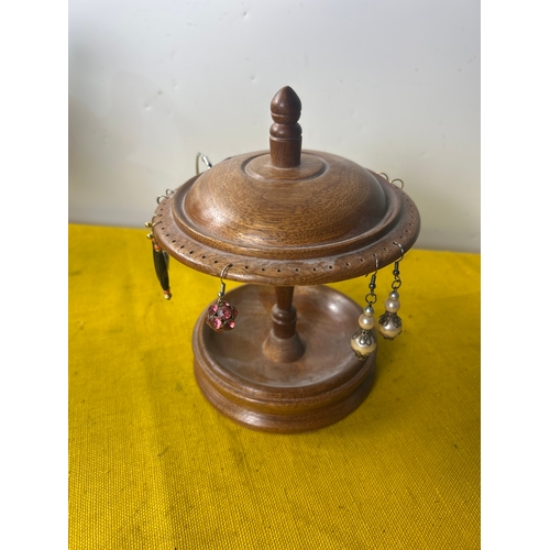 4 - Costume earrings on a carousel wooden holder