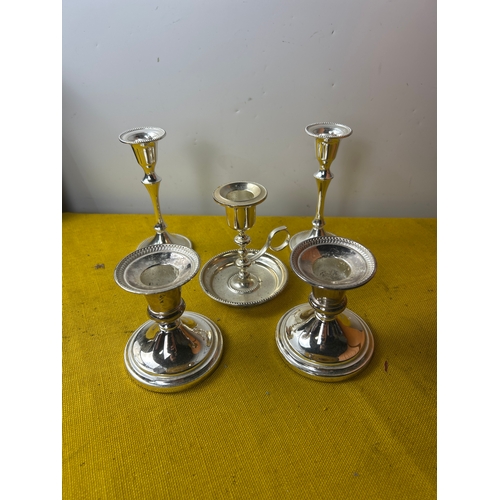 18 - 5 silver plate candle holders in good condition