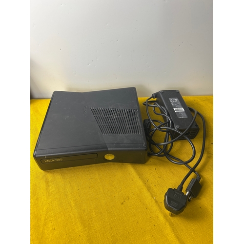 24 - Xbox 360 slim console with power lead - untested
