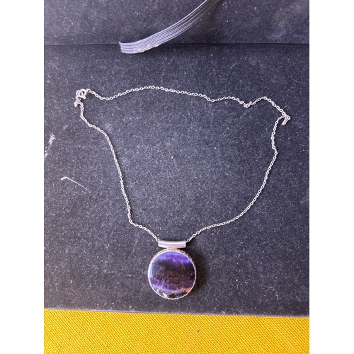 44 - Sterling silver necklace with ingot style pendant in purple stone - 16.5g