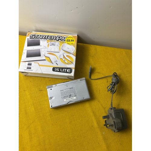48 - Grey Nintendo DS lite console with game, charger and accessory pack - working