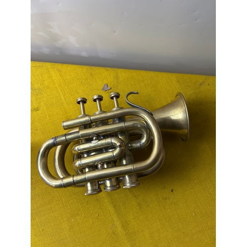 Miniature brass Heley London hand trumpet