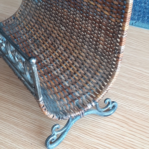 3 - Cast iron and wicker magazine rack